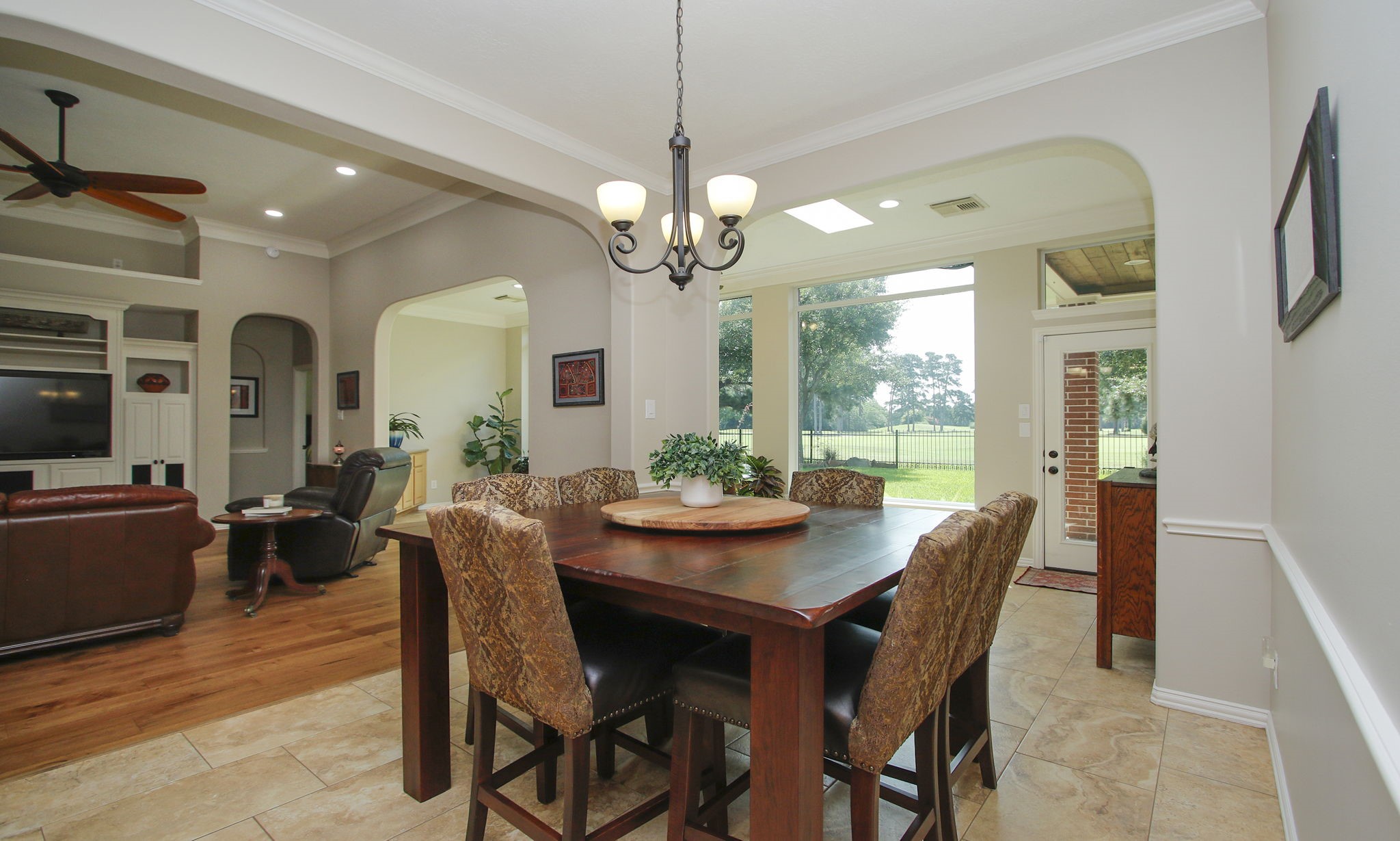 20110 Stormy Pine Lane Spring, TX 77379 - Photo 20 of 44 View from the breakfast area overlooking the sunroom with stunning golf course views.