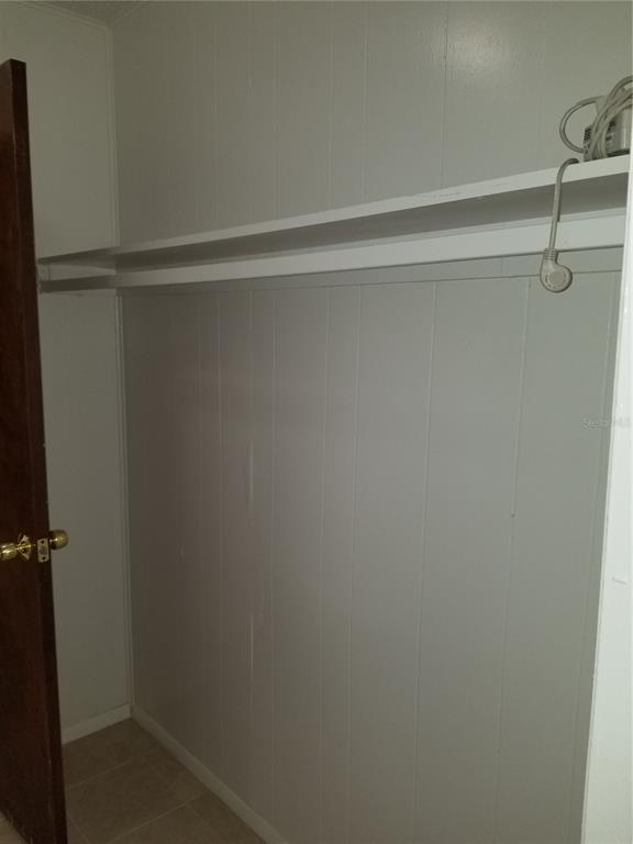 1306 East 137th Avenue, Unit B Tampa, FL 33613 - Photo 9 of 10 a close view of closet