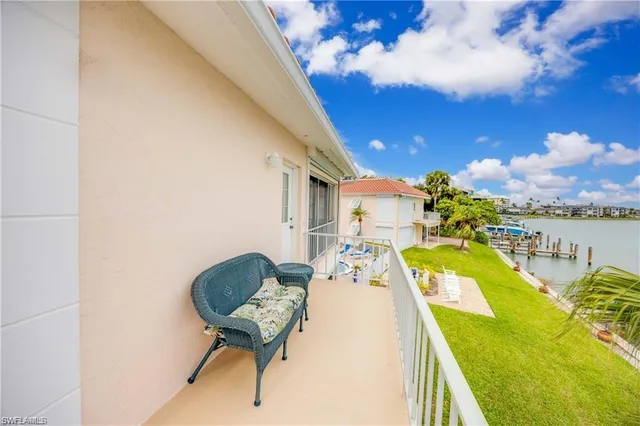 a view of a swimming pool with lounge chair