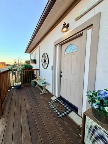 a view of entryway with wooden floor