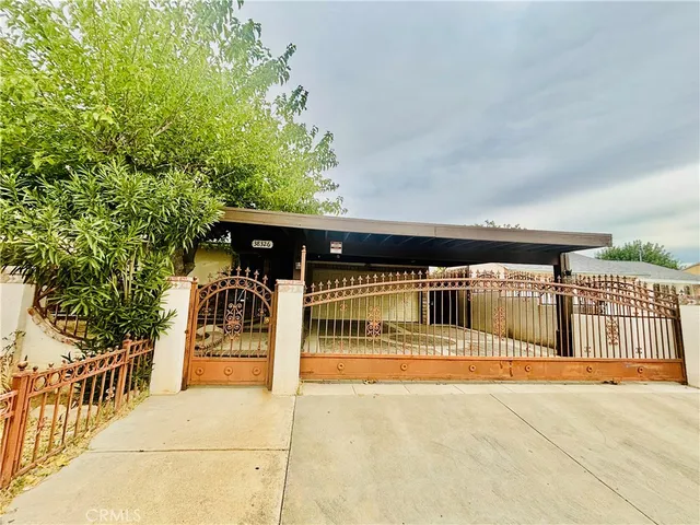 a view of a swimming pool with an outdoor seating