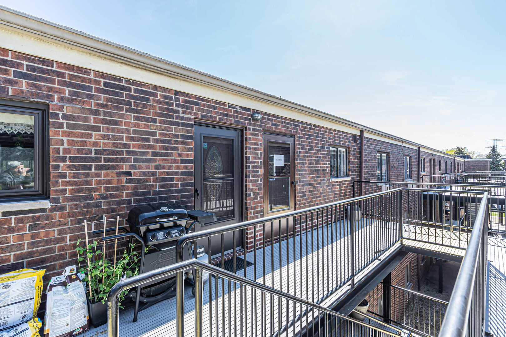 942 North Rohlwing Road, Unit 201E Addison, IL 60101 - Photo 25 of 25 a view of a balcony with two chairs