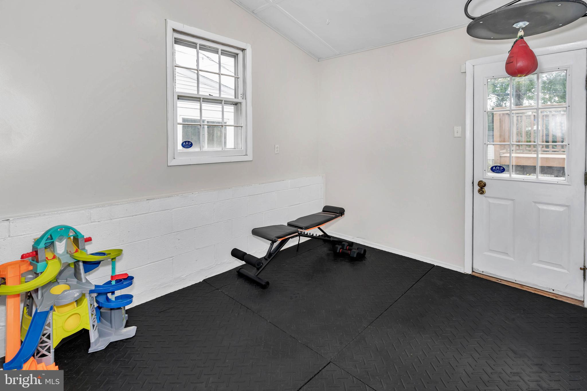304 Pinehurst Road Wilmington, DE 19803 - Photo 24 of 34 Walkout fitness/multi-purpose room off den