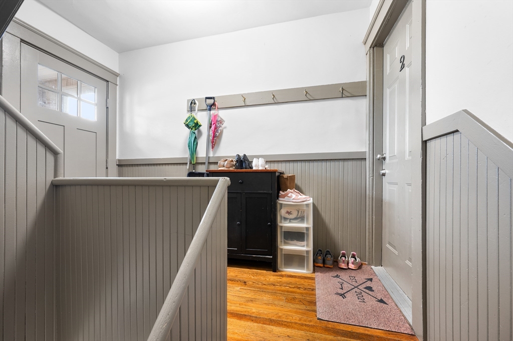19 Oliver Street, Unit 2 Milford, MA 01757 - Photo 16 of 20 a view of living room with furniture and mirror