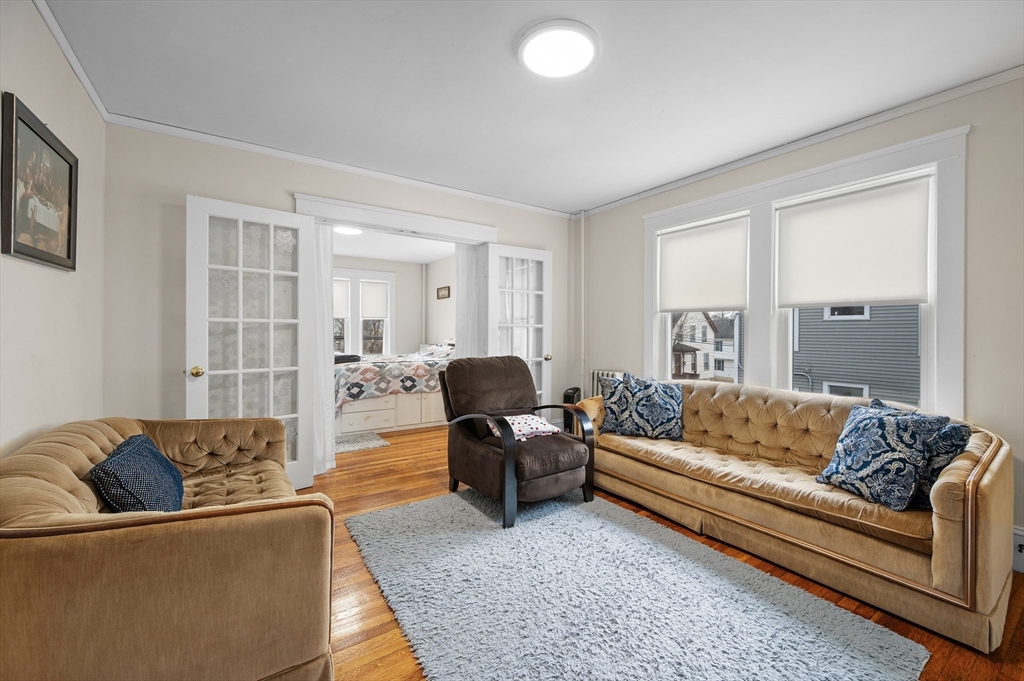 19 Oliver Street, Unit 2 Milford, MA 01757 - Photo 4 of 20 a living room with furniture and a couch
