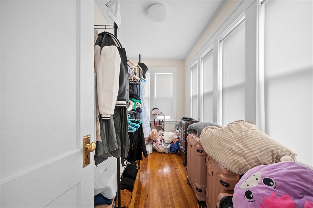 19 Oliver Street, Unit 2 Milford, MA 01757 - Photo 9 of 20 a view of a livingroom with furniture and windows