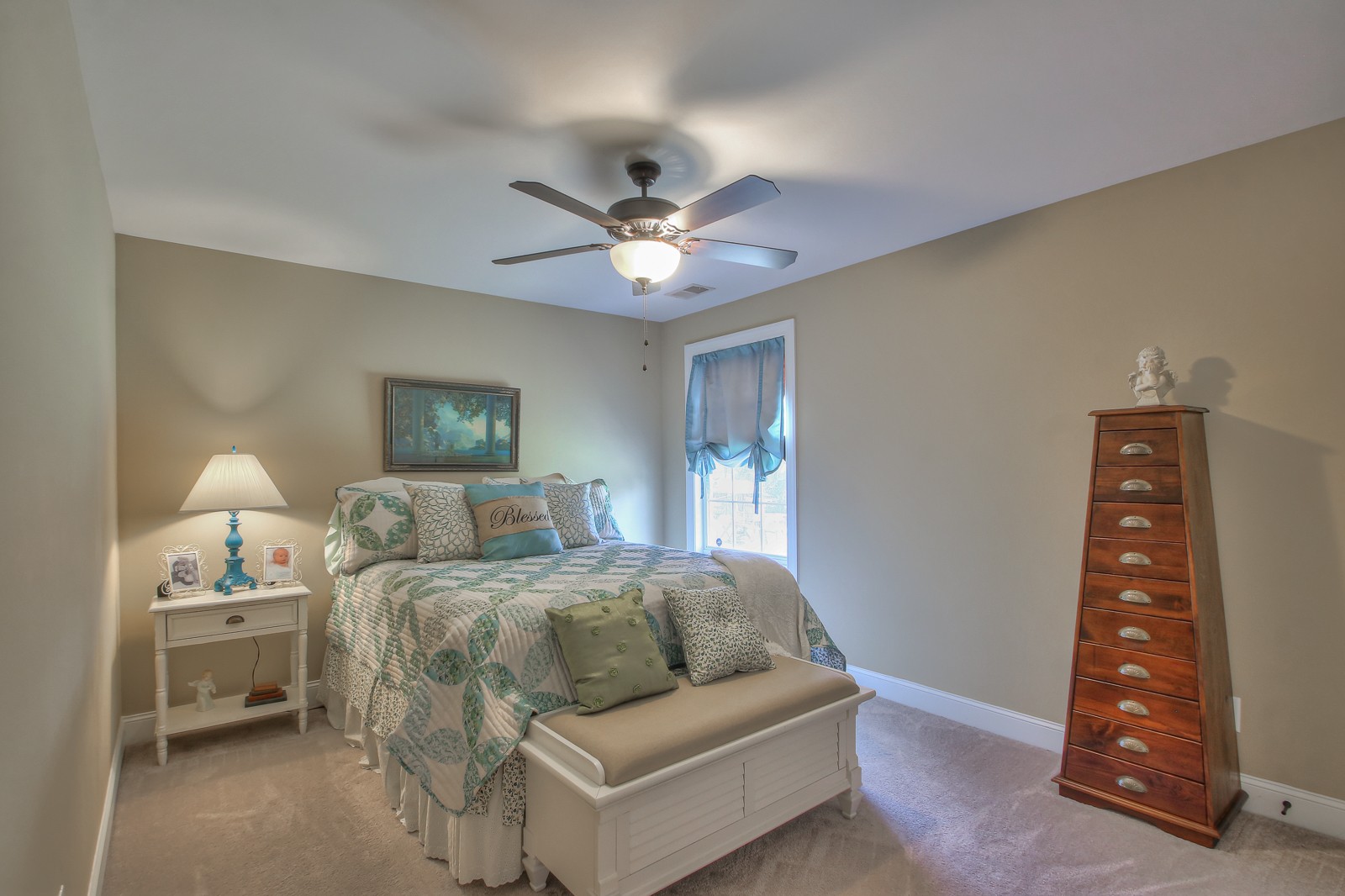 1225 Rimrock Road Smyrna, TN 37167 - Photo 16 of 24 a bedroom with a bed and a chandelier