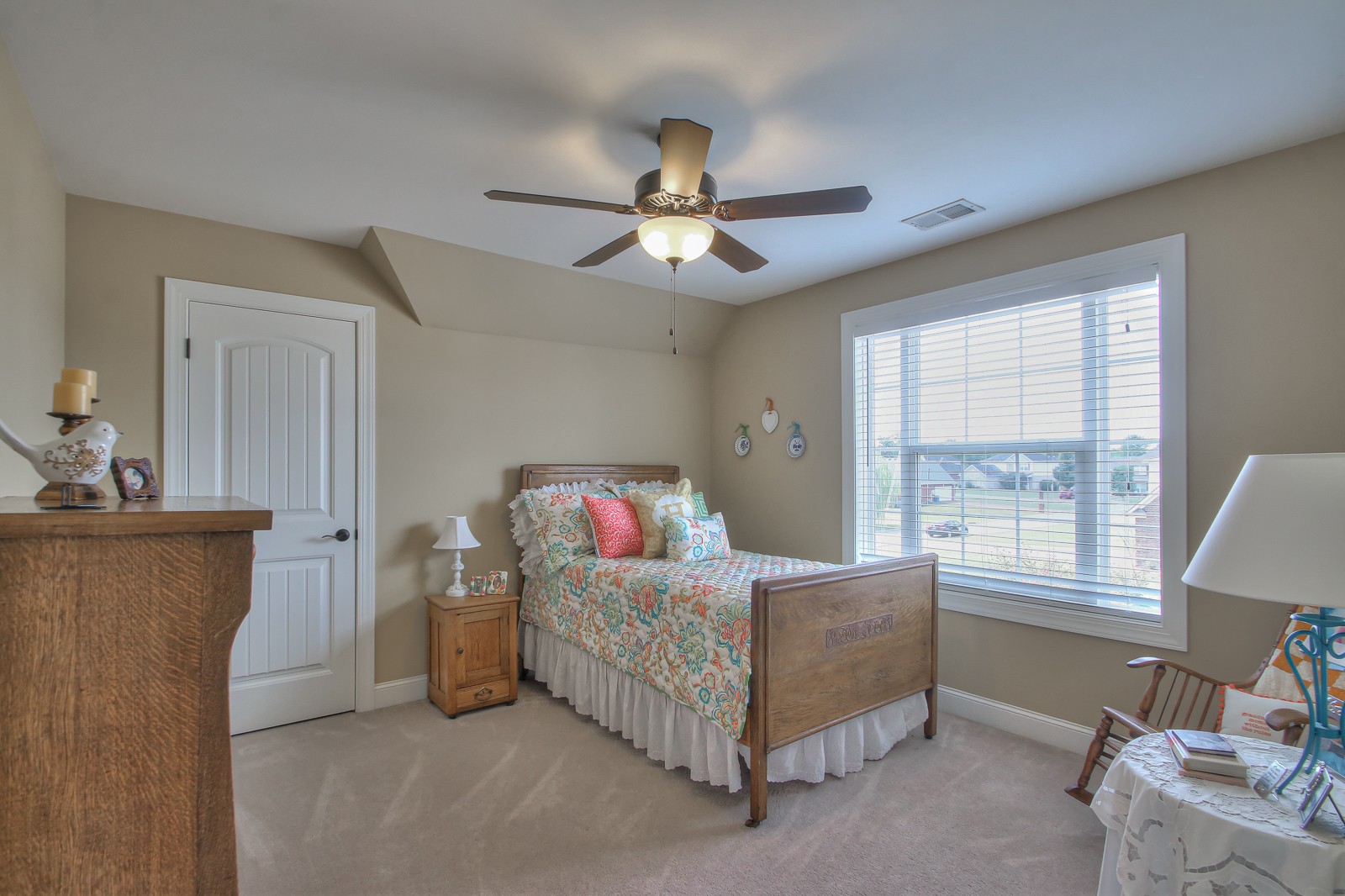 1225 Rimrock Road Smyrna, TN 37167 - Photo 18 of 24 a bedroom with a bed and a chandelier
