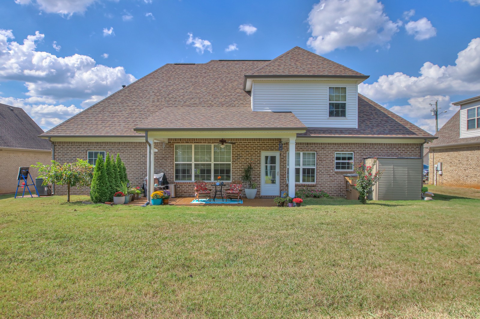 1225 Rimrock Road Smyrna, TN 37167 - Photo 22 of 24 a front view of a house with a yard and garage