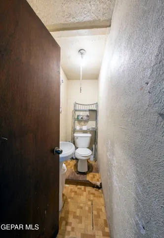 a bathroom with a sink and a toilet