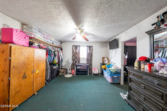 a children room with toys and a flat screen tv