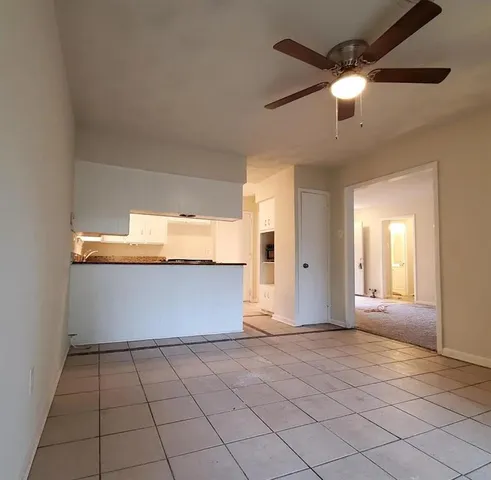 a view of an empty room with window