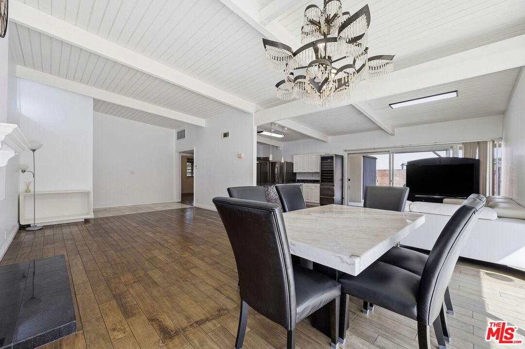 18342 Blackhawk Street Porter Ranch, CA 91326 - Photo 22 of 56 a view of a dining room with furniture