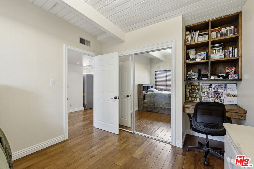 18342 Blackhawk Street Porter Ranch, CA 91326 - Photo 26 of 56 a view of a livingroom with furniture and wooden floor