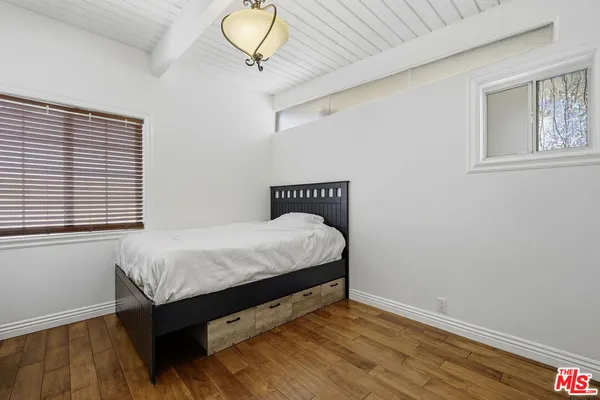 a view of a livingroom with wooden floor