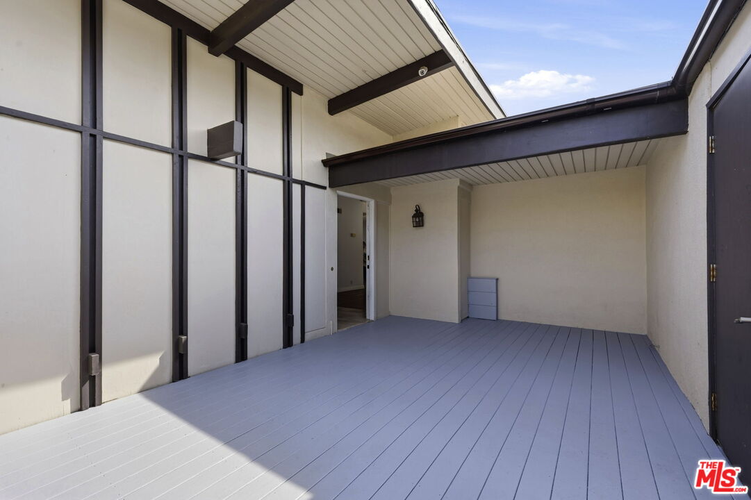 18342 Blackhawk Street Porter Ranch, CA 91326 - Photo 3 of 56 an empty room with wooden floor and windows