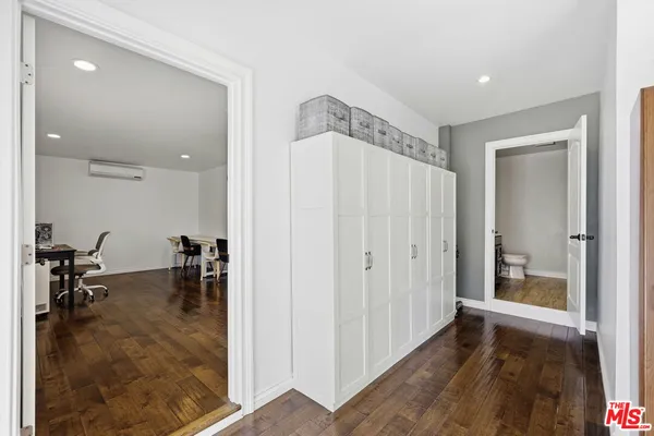 a bathroom with a bathtub and a sink
