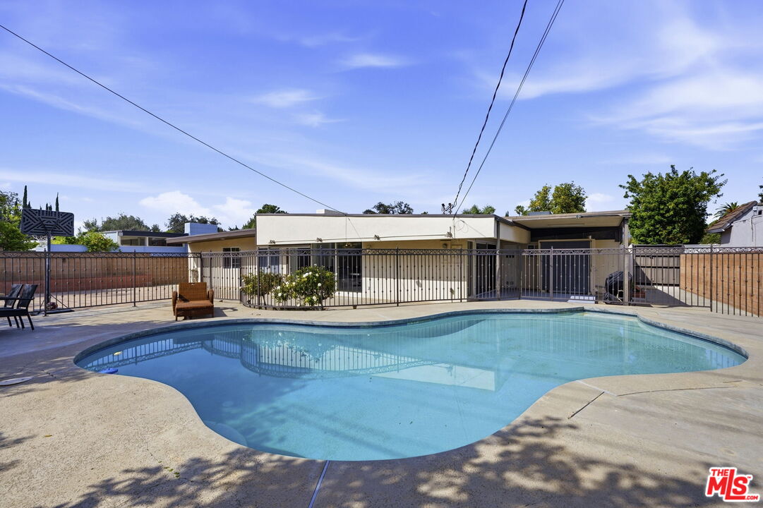 18342 Blackhawk Street Porter Ranch, CA 91326 - Photo 54 of 56 a view of a house with entertaining space