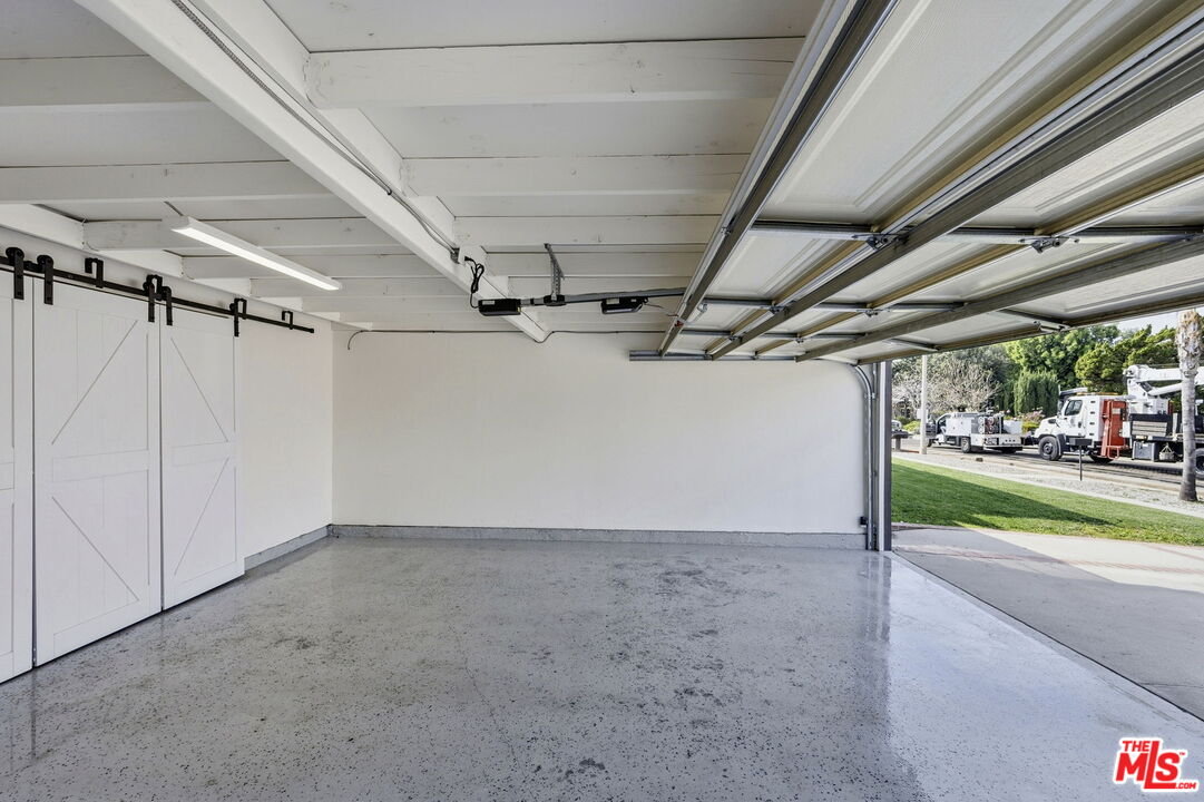 18342 Blackhawk Street Porter Ranch, CA 91326 - Photo 56 of 56 a view of a garage