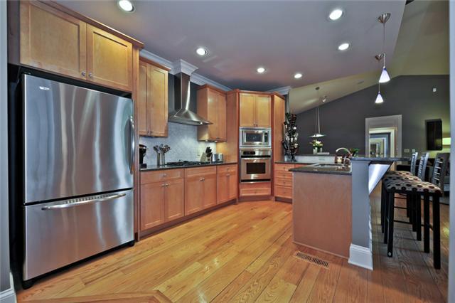 4124 Sneed Road Nashville, TN 37215 - Photo 5 of 20 BREAKFAST BAR, GRANITE COUNTERTOPS & HARDWOOD FLOOR