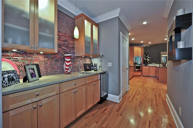 4124 Sneed Road Nashville, TN 37215 - Photo 7 of 20 WET BAR WITH STAINLESS ICE MAKER, GLASS UPPER CABINETS & BEAUTIFUL GLASS BACKSPLASH