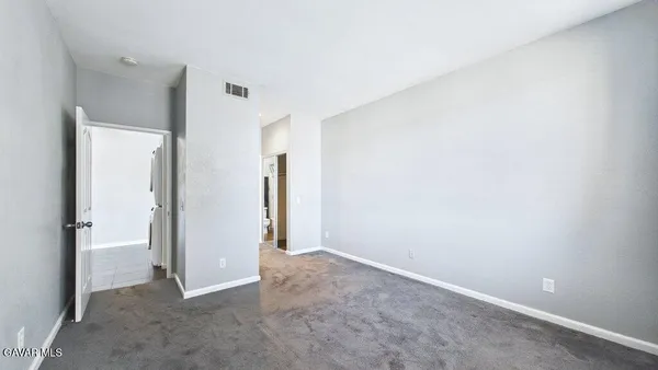 an empty room with a door
