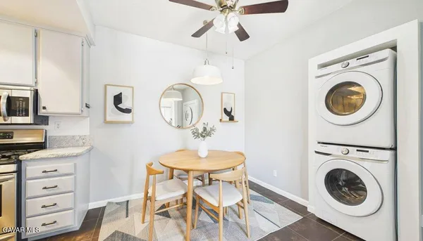 a view of a dining room kitchen and a sink
