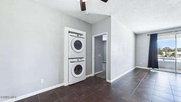 a view of a storage & utility room with washer and dryer