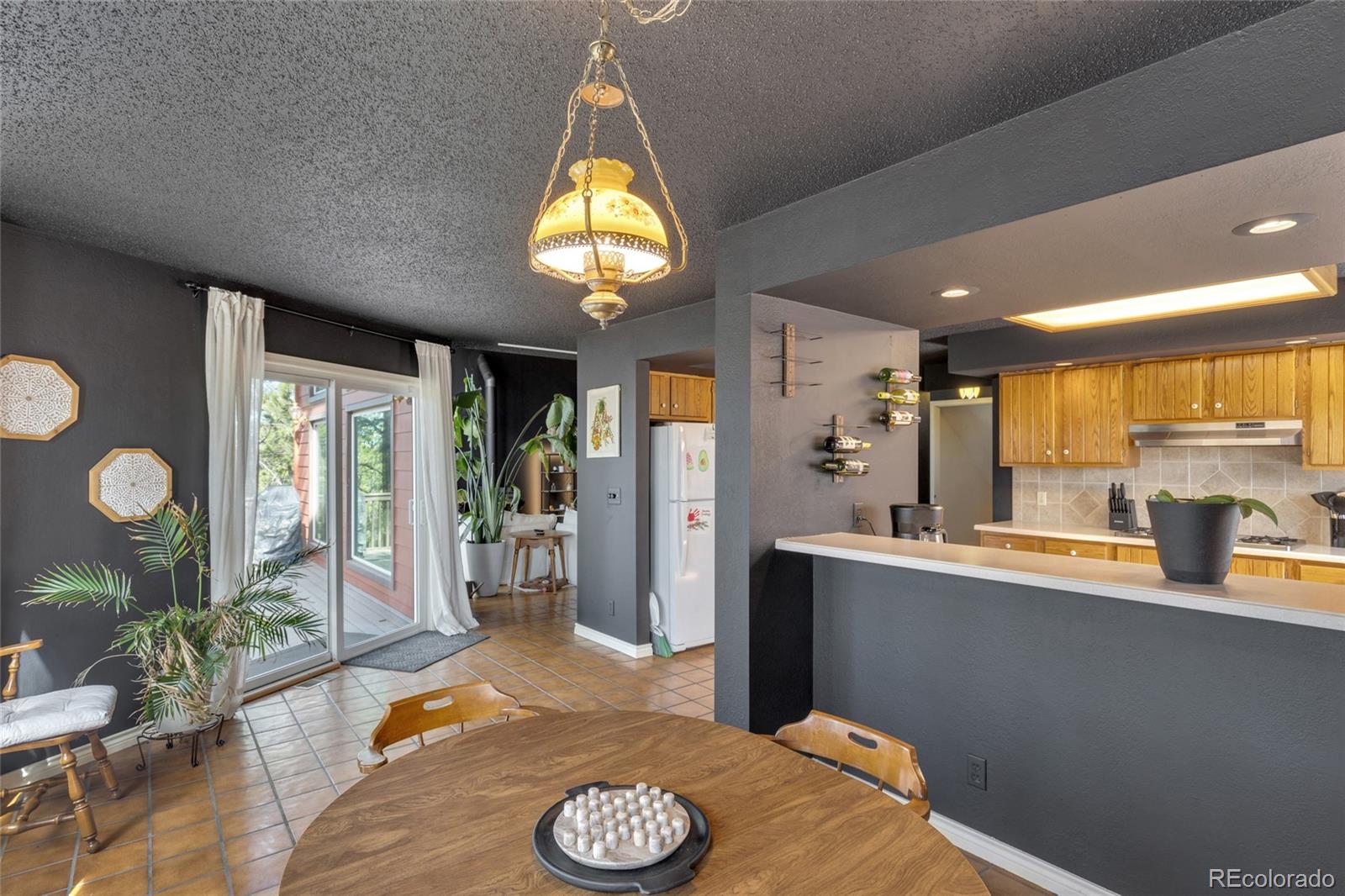 9805 Deerfield Road Franktown, CO 80116 - Photo 13 of 49