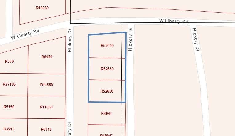 1115 Hickory Drive Harleton, TX 75651 - Photo 2 of 3 a bathroom with a shower and a mirror