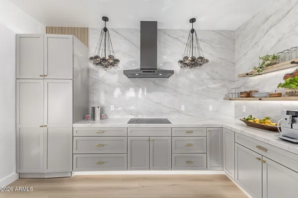 a cabinet with wine items on it