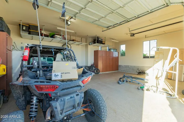 a view of a road with a bench in front of it