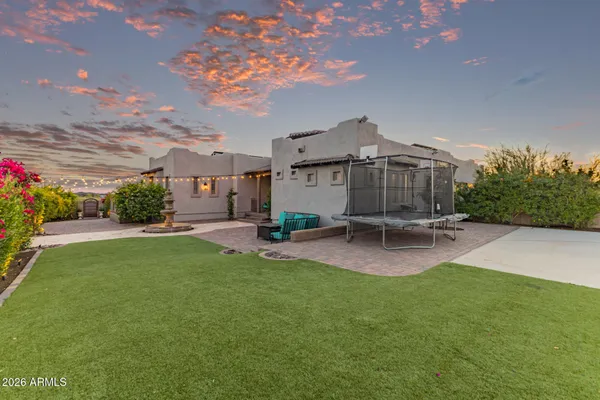 a view of a pathway with a plants