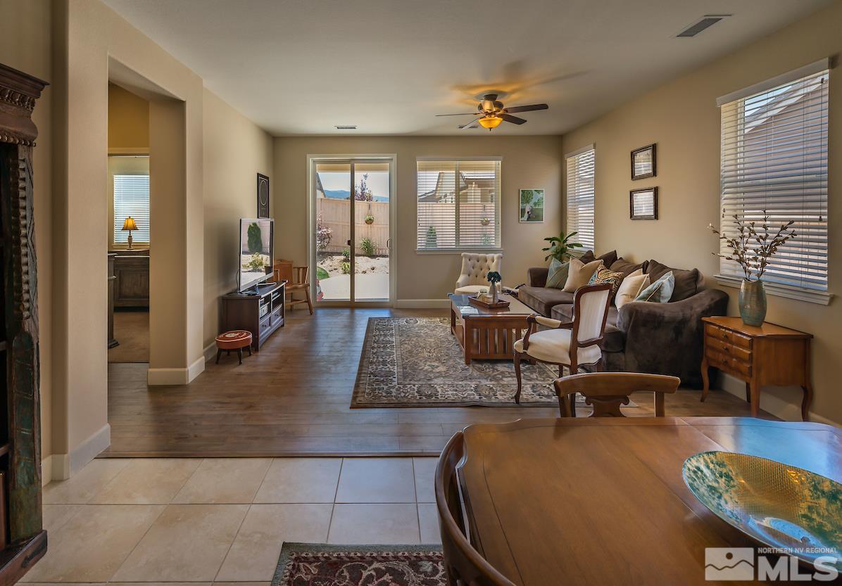 10045 Ignacio Circle Reno, NV 89521 - Photo 5 of 12 a living room with furniture rug and window