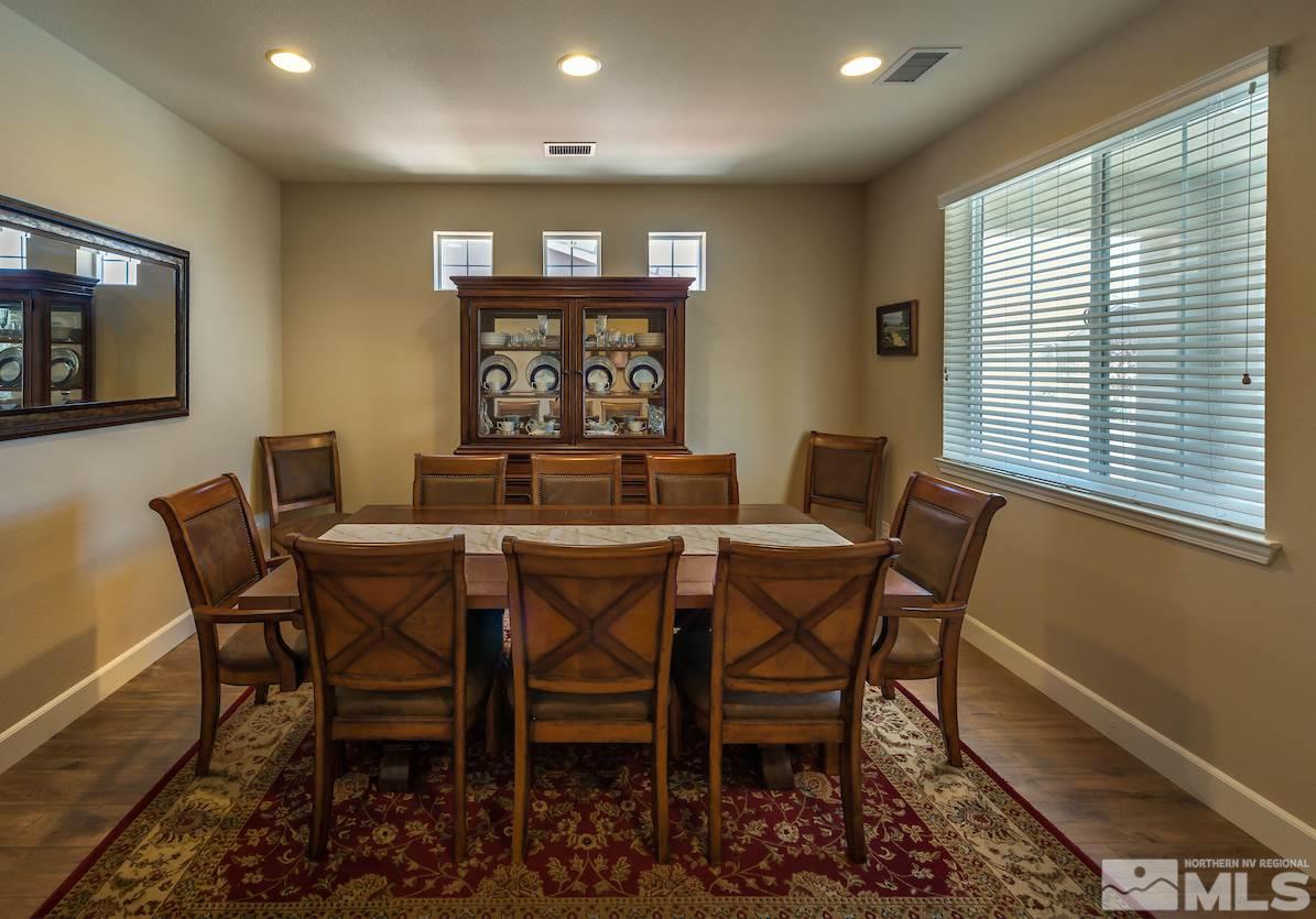 10045 Ignacio Circle Reno, NV 89521 - Photo 6 of 12 a view of a dining room with furniture
