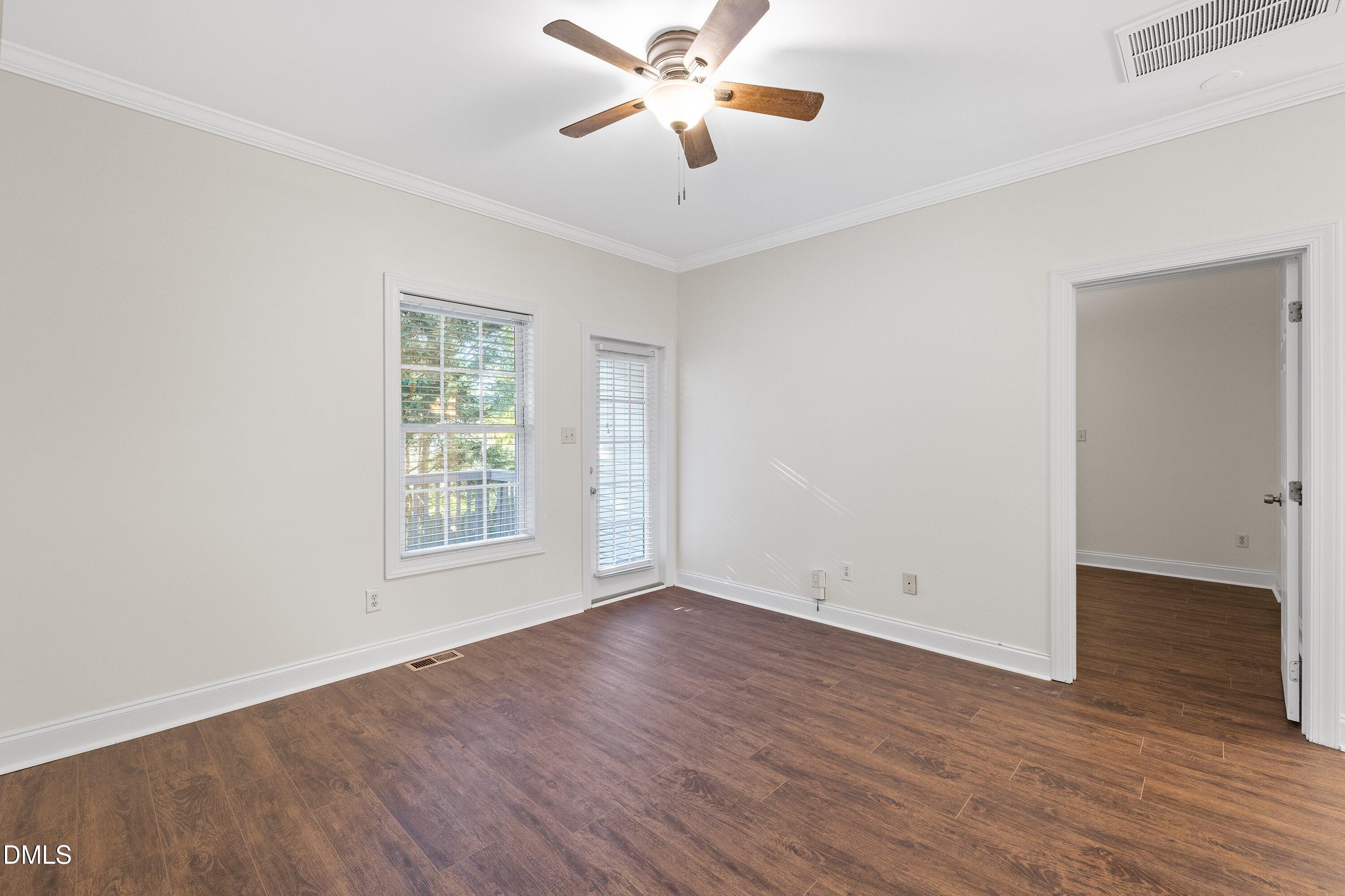 4120 Standing Rock Way Raleigh, NC 27604 - Photo 14 of 37 wooden floor in an empty room with a window