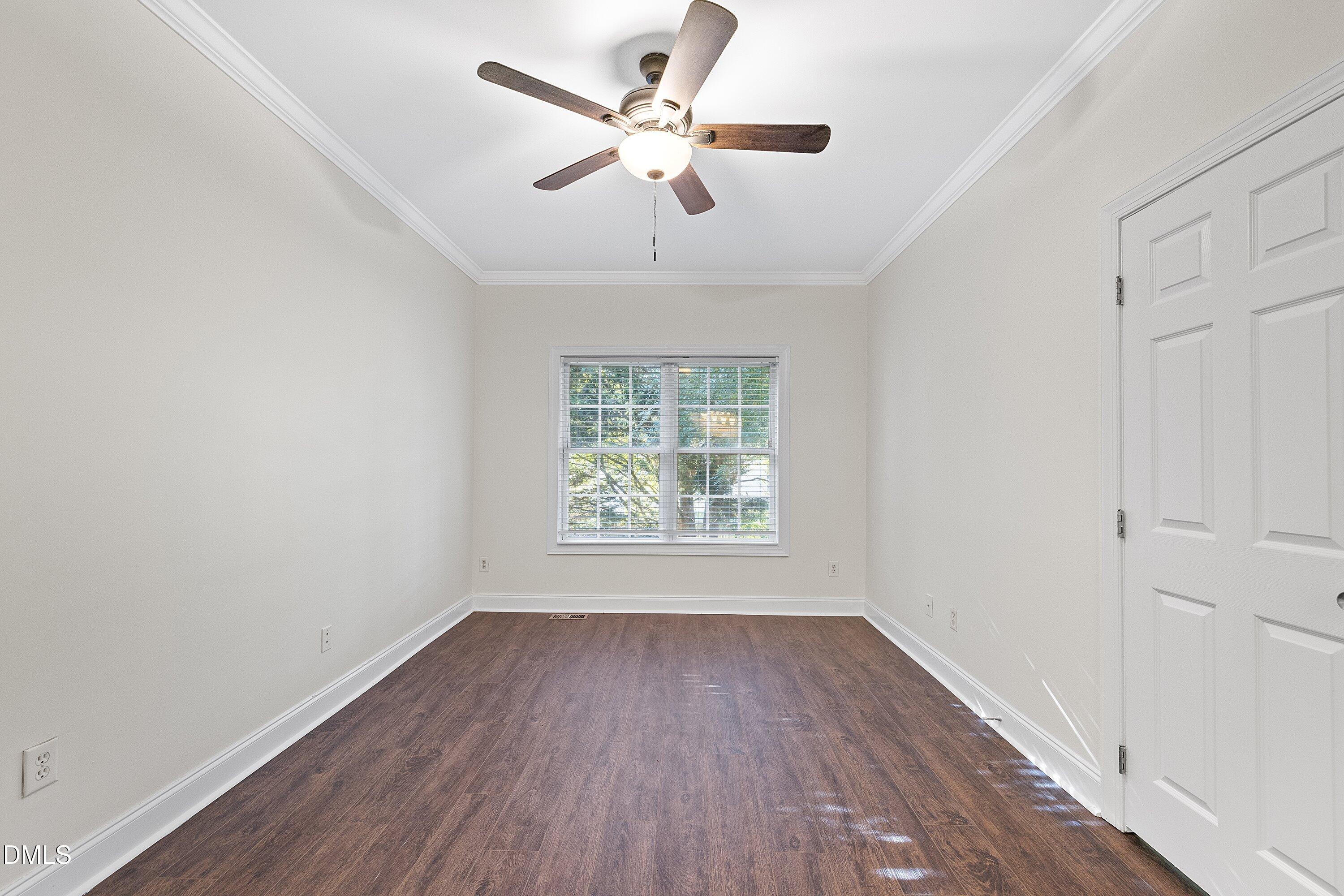 4120 Standing Rock Way Raleigh, NC 27604 - Photo 18 of 37 wooden floor in an empty room with a window