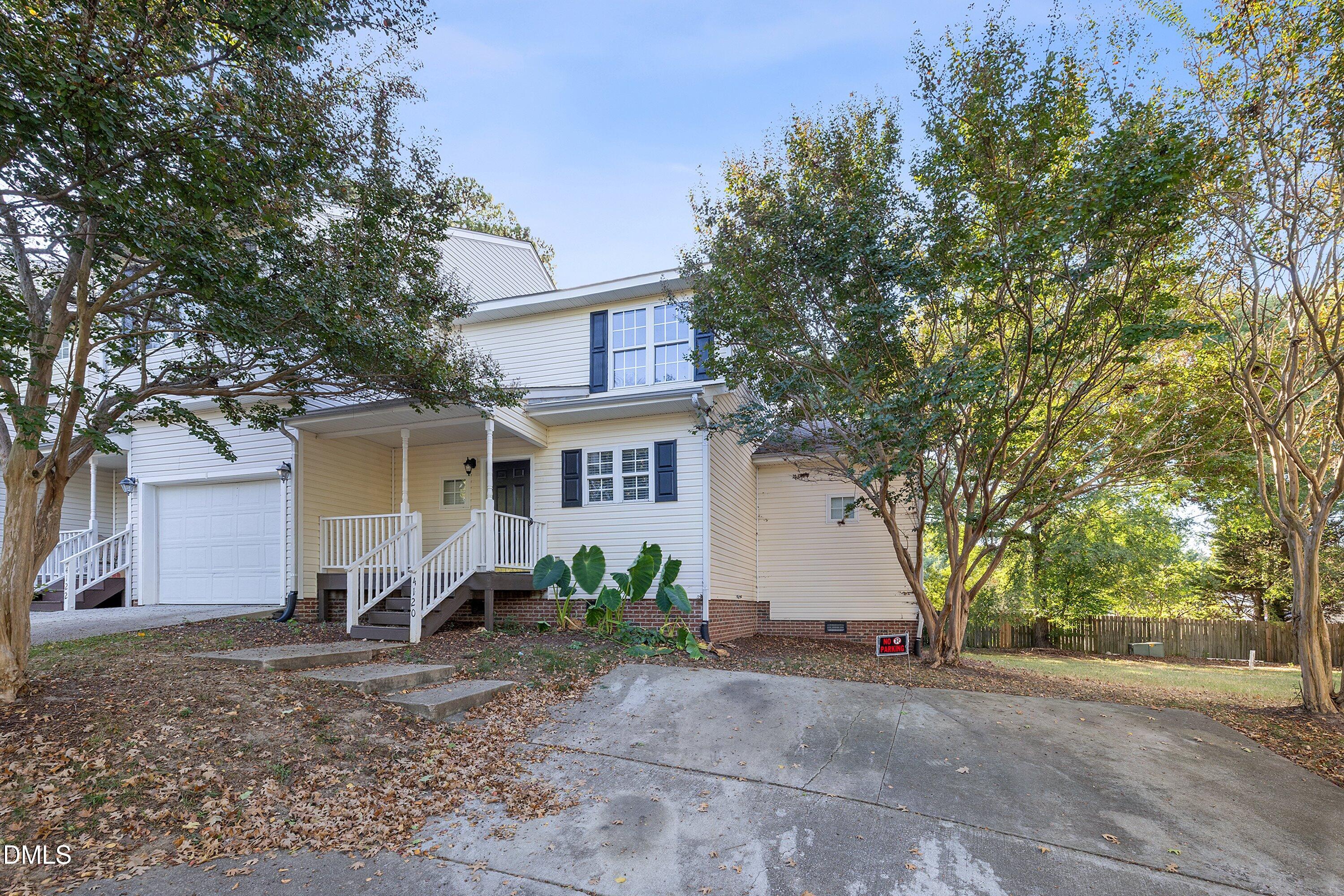 4120 Standing Rock Way Raleigh, NC 27604 - Photo 2 of 37 a view of a house with a yard