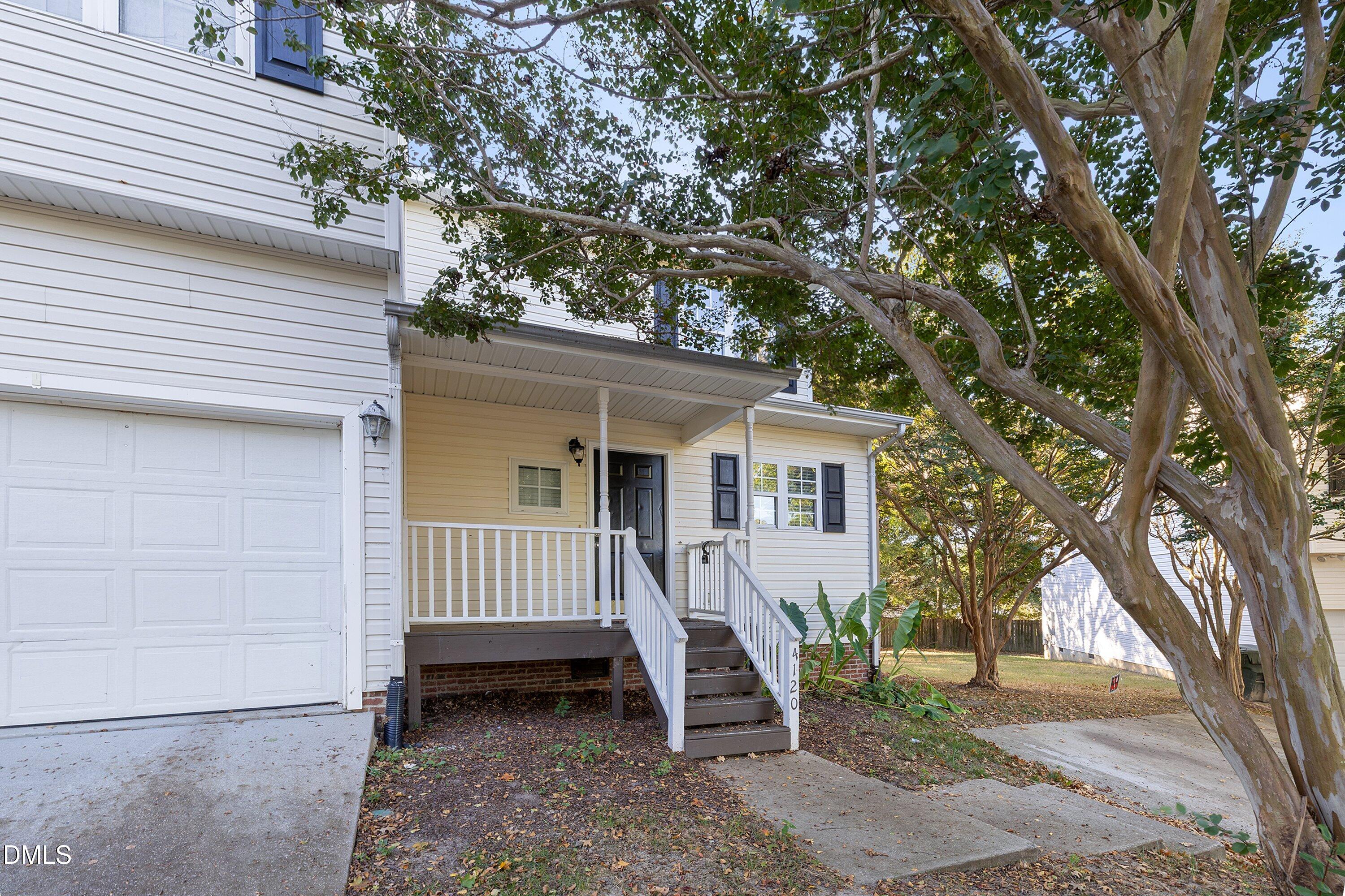 4120 Standing Rock Way Raleigh, NC 27604 - Photo 3 of 37 a view of a house with a yard