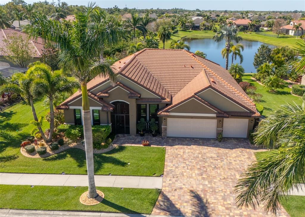 317 Cockle Shell Loop Apollo Beach, FL 33572 - Photo 1 of 1 BEAUTIFUL TROPICAL SETTING