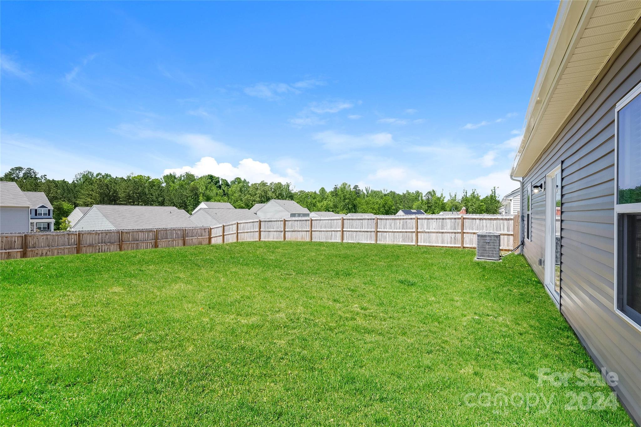 7323 Amberly Hills Road Charlotte, NC 28215 - Photo 13 of 14 a view of a backyard