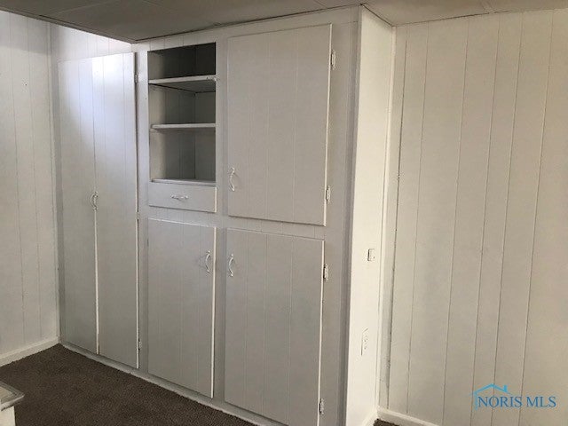 2536 Castleton Avenue Toledo, OH 43613 - Photo 14 of 21 Built-in cabinets at the foot of the basement stairs