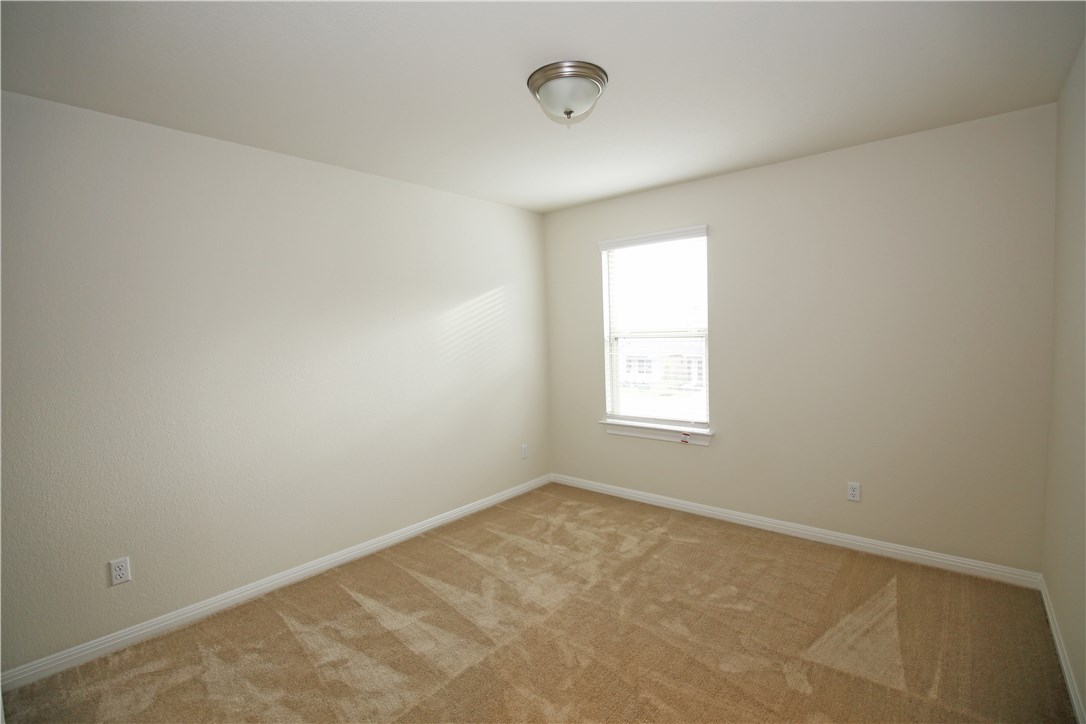 15912 Cessida Street Austin, TX 78728 - Photo 18 of 23 an empty room with a window
