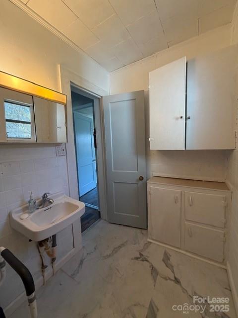 1711 Dickinson Road Hickory, NC 28602 - Photo 8 of 13 a bathroom with a sink a toilet and mirror