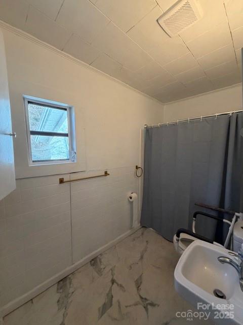 1711 Dickinson Road Hickory, NC 28602 - Photo 9 of 13 a bathroom with a sink and a mirror