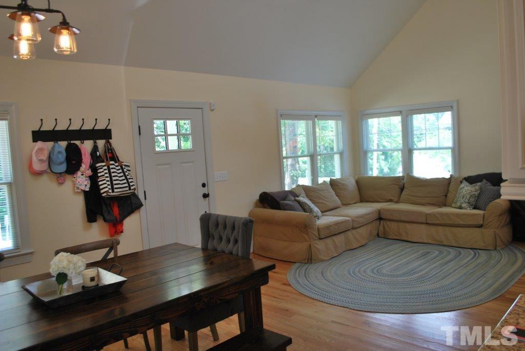918 Dixie Trail Raleigh, NC 27607 - Photo 13 of 23 a living room with furniture and wooden floor