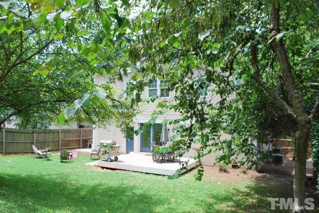918 Dixie Trail Raleigh, NC 27607 - Photo 22 of 23 a view of a chair and table in the garden