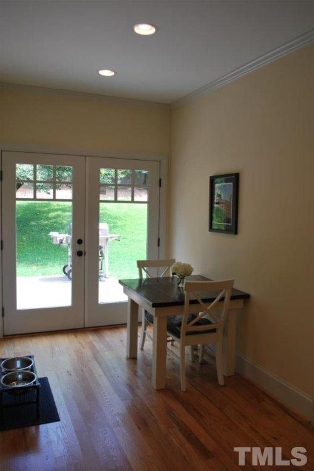 918 Dixie Trail Raleigh, NC 27607 - Photo 10 of 23 a view of a workspace with furniture and a window