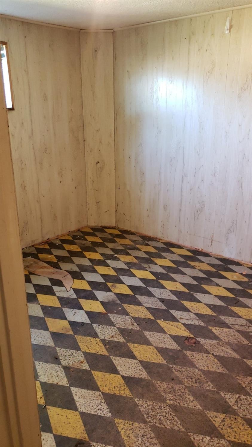 1421 Reese Creek Road Eagle Point, OR 97524 - Photo 21 of 34 a view of a room with wooden floor