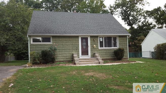 4 Wilcox Road New Brunswick, NJ 08901 - Photo 1 of 14 front view of a house with a yard